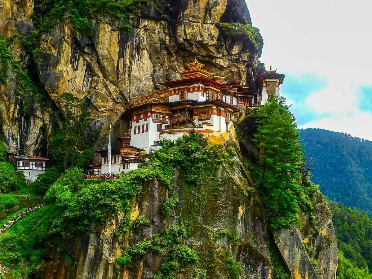 Tiger’s Nest Monastery built into a steep cliffside high above the Paro Valley in Bhutan.